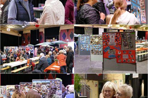 Menschen unterhalten sich und betrachten Ausstellungen bei einer Veranstaltung in einer großen Halle mit Festzeltatmosphäre.